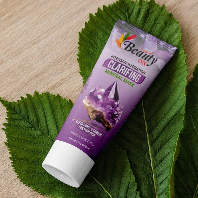Beauty ON Clarifying Mineral Mask for clear pores and smooth skin, sulfate-free, on green leaves